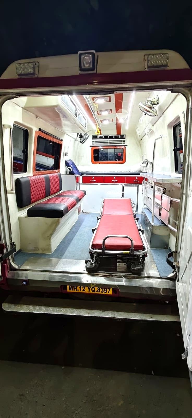 Ambulance interior with stretcher for wheelchair-dependent patients